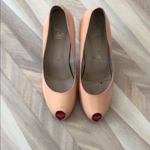 Christian Louboutin heels. Well loved!
